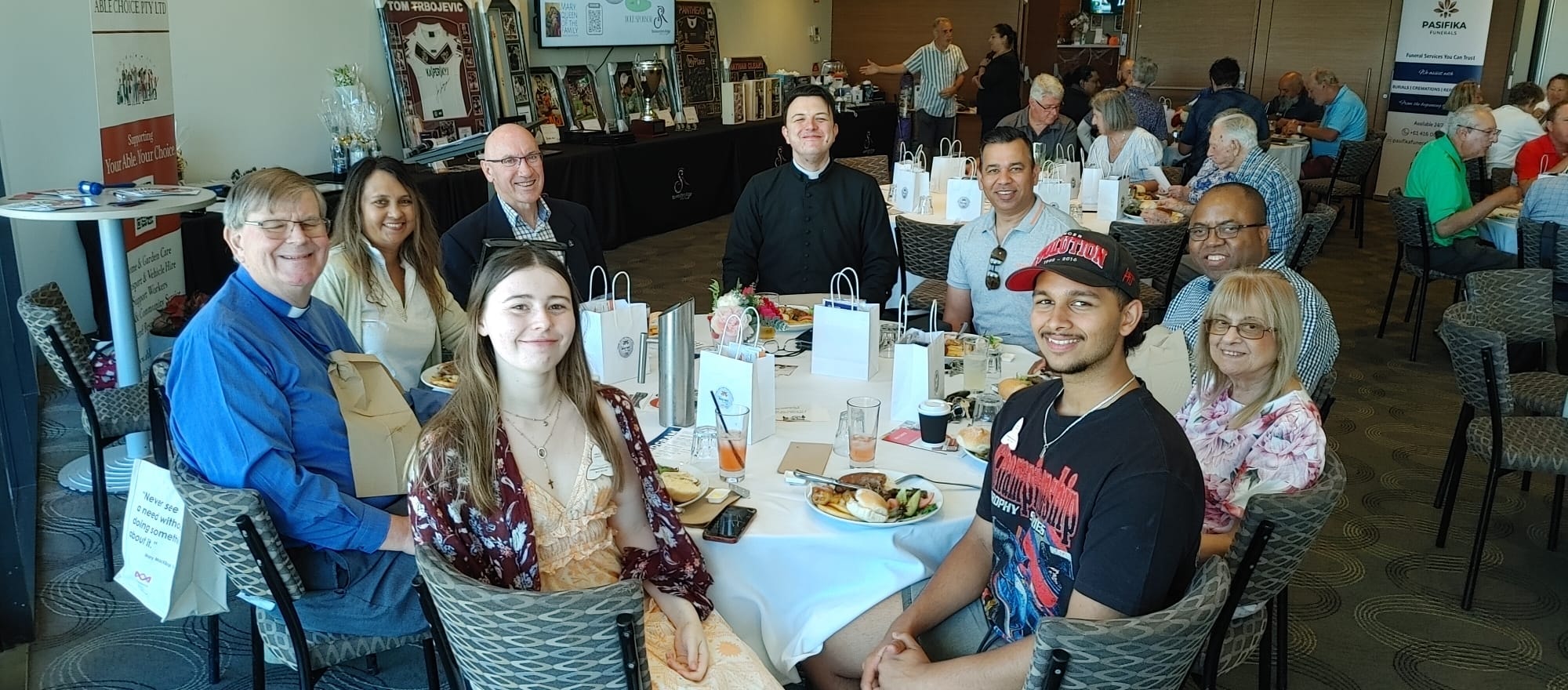 Able Choice team at a community event with participants