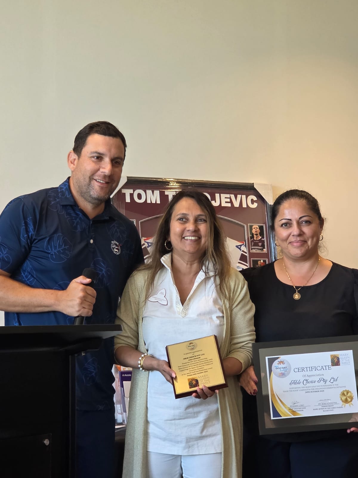Able Choice receiving a Certificate of Appreciation